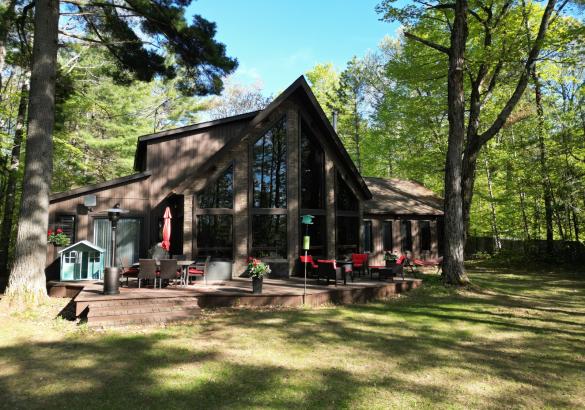 brown cottage with point and full glass.